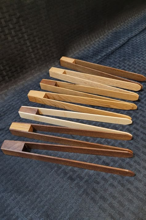 A fresh batch of Toaster Tongs! These are so handy and can be used for more than just toast. Check out my Etsy page. Wooden Gadgets Diy, Wooden Kitchen Items, Toaster Tongs, Wooden Tongs, Wood Kitchen Accessories, Wood Kitchen Tool, Wood Kitchen Utensils, Kitchen Tongs, Wood Dishes