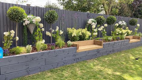 Raised Bed Patio Border, Raised Garden Beds Side Of House, Raised Flower Beds Ideas, Gardens With Raised Beds, Raised Sleeper Beds, Raised Beds Along Fence, Raised Bed Planting Ideas, Raised Garden Bed Fence, Raised Flower Beds Along Fence