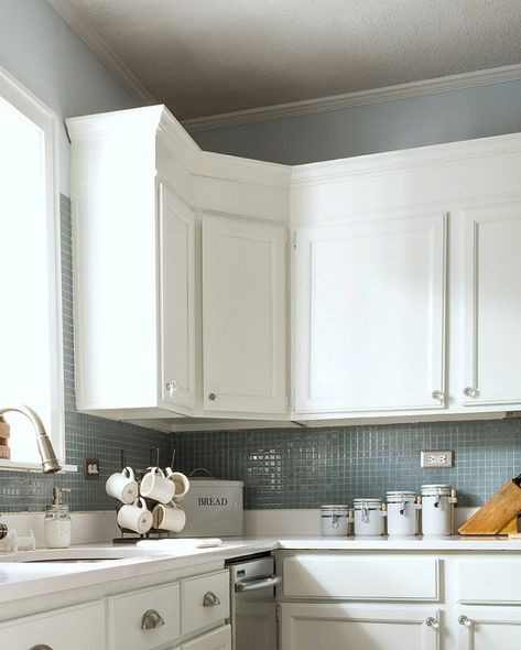 How To Install Crown Molding On Kitchen Cabinets | Crown molding can give your cabinets an extra air of charm and sophistication. | Kitchen Cabinet Kings Crown Moulding Kitchen Cabinets, Kitchen Trim, Painting A Sink, Kitchen Cabinets Trim, Install Crown Molding, Trim Inspiration, Kitchen Cabinet Molding, Cheap Backsplash, Crown Molding Kitchen