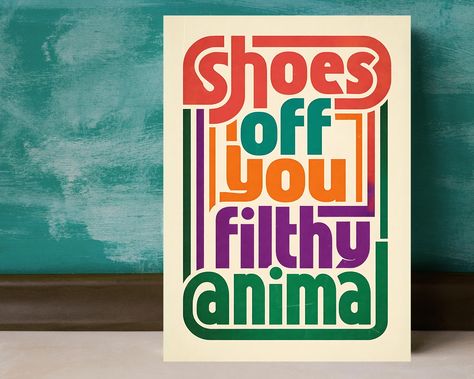 Welcome your guests with a touch of humor using our "Shoes Off You Filthy Animal" print. This funny and stylish shoe sign is perfect for politely reminding visitors to remove their shoes upon entering. Whether you're looking to add a playful touch to your entryway, hallway, or mudroom, this poster fits right in with any decor style. It's not just a sign--it's a statement piece that adds personality to your home! Features: Humorous Design: The "Shoes Off You Filthy Animal" quote adds a lightheart Remove Your Shoes Sign Entryway, Remove Your Shoes Sign Funny, Shoe Free Home Sign, Take Your Shoes Off Sign Front Doors, Shoe Sign, No Shoes Sign, Shoes Off Sign, Shoes Poster, Game Cafe