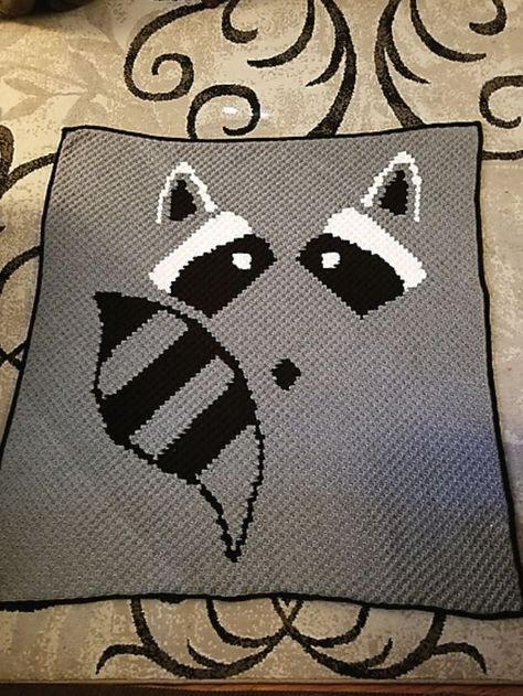 Fun And Sweet C2C Crochet Blankets.This sweet raccoon blanket will make your kiddo nursery so cool and fun looking! C2C projects are really fun, especially if you like to crochet with others. This cute little raccoon will be less lonely if you crochet a matching amigurumi! #freecrochetpattern #blanket #throw Wolf C2c Crochet Pattern, Crochet Raccoon Blanket Pattern, Crochet Raccoon Blanket, Baby Boy Crochet Blanket, Free Baby Blanket Patterns, Crochet Knit Blanket, C2c Crochet Blanket, Crochet Penguin, Crochet Granny Square Afghan