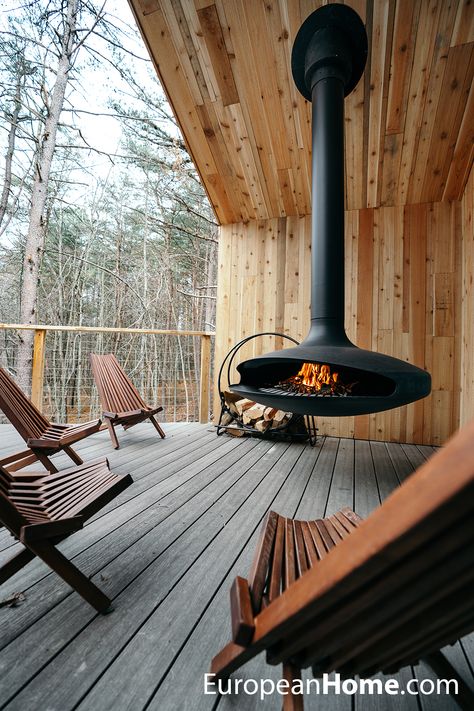 The Box Hop in Hocking Hills, OH makes luxury homes out of shipping containers. Their B&B The Hygge features two of our suspended fireplaces by @FocusCreation. Here you can see the Gyrofocus outdoor suspended fireplace making the back porch a comfortable place to gather and enjoy the scenery! #europeanhome #frenchdesign #madeinfrance #suspendedfireplace #floatingfireplace #hangingfireplace #outdoorfireplace #hockinghills #bedandbreakfast Mid Century Fireplace, Dream Fireplace, Suspended Fireplace, Hanging Fireplace, Sunken Fire Pits, Floating Fireplace, Outside Fireplace, European Home, Hocking Hills