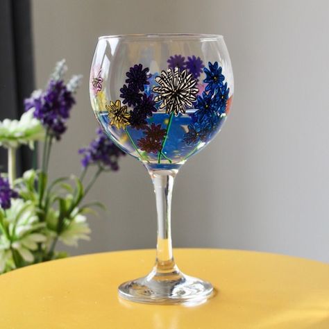 Wildflower Design  This beautiful hand painted floral gin glass is made to order meaning no two are 100% the same. It would make the perfect statement piece for any home bar or kitchen.  Enjoy your favourite gin and tonic in style!  Ideal for all occasions including:  ✨Birthday Gift ✨Anniversary Gift ✨Christmas Gift  ✨New Home Gift  ✨New Job Gift  ✨Wedding Gift  ✨Bridesmaid Gift  ✨New Mum Gift  You can make this glass extra special with the option to add personalisation around the main glass (Ex Pink Tissue Paper, Wildflower Design, Wildflower Meadow, Acrylic Paint Pens, New Job Gift, Cerise Pink, Wedding Gifts For Bridesmaids, Gin And Tonic, Paint Pens