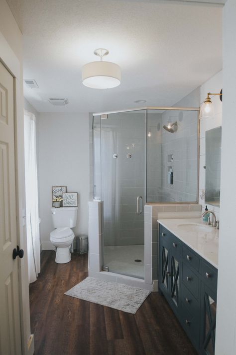 Modern farmhouse bathroom with corner shower Master Bath With Corner Shower Bathroom Layout, Corner Shower In Small Bathroom, Bathroom For Two People, Corner Shower With Window Master Bath, Corner Shower Renovation, Shower In Corner Of Bathroom, Small Bathroom Ideas Corner Shower Layout, Corner Bathroom Layout, Neo Angle Shower Bathroom Remodel