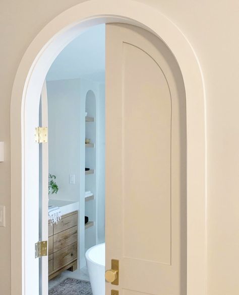 A peek inside the arched doorway to a masterbath with custom vanities and marble floors. Arched Bathroom, Bathroom Door Ideas, Arched Interior Doors, Arched French Doors, Arch Doorway, Arch Interior, Arched Doors, Bathroom Door, Bathroom Doors