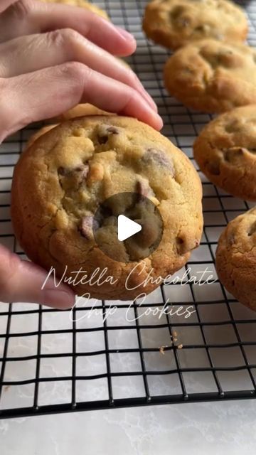 FOODIE JERG🍸 on Instagram: "Nutella chocolate chip cookies 🍪   📹Cr: @sweetnestdownunder  Here's a simple recipe for Nutella chocolate chip cookies:  Ingredients:  1 cup (2 sticks) unsalted butter, softened  1 cup granulated sugar  1 cup packed brown sugar  1 cup Nutella  2 large eggs  1 teaspoon vanilla extract  3 cups all-purpose flour  1 teaspoon baking soda  1/2 teaspoon baking powder  1/2 teaspoon salt  1 cup semi-sweet chocolate chips  Instructions:  1. Preheat your oven to 350°F (175°C) and line baking sheets with parchment paper. 2. In a large bowl, cream together the butter, granulated sugar, and brown sugar until light and fluffy 3. Add the Nutella and mix until combined. 4. Beat in the eggs, one at a time, then stir in the vanilla extract. 5. In another bowl, whisk together th Nutella Cookies 3 Ingredients, Nutella Chocolate Chip Cookies, Chocolate Chip Cookies Ingredients, Nutella Cookies, Chocolate Nutella, Semi Sweet Chocolate Chips, Sweet Chocolate, Cookies Ingredients, Baking Sheets