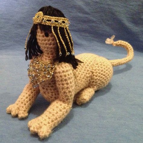 Made for a friend who wanted a female Sphinx with black hair and "Egyptian" jewelry. I tried! Egypt Bastet, Crochet Animal Hats, Gods Of Egypt, Animal Hats, Crochet Animal, Egyptian Jewelry, Enjoy Writing, Movie Characters, Crochet Animals