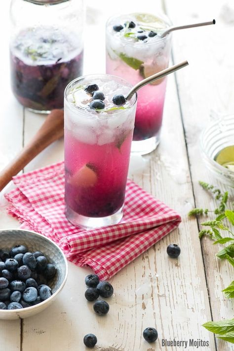 A seasonal twist on the classic mint and rum cocktail recipe: Blueberry Mojitos. A faux-jito (mocktail) option too for those preferring no alcohol. Blueberry Mojitos, Fruity Drink Recipes, Soda Floats, Rum Cocktail Recipes, Blueberry Juice, Blueberry Lemonade, Lemon Sorbet, Themed Drinks, Beach Meals