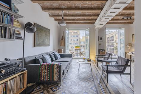 A Refurbished Flat With Catalan-Vaulted Ceilings Lists for €760K in Barcelona - Dwell Rustic Living Room Ceiling, Barcelona Apartment, Small Terrace, Kitchen And Bath Remodeling, Bedroom Corner, Architecture Landmark, Entry Hallway, Room Ceiling, Iron Railing