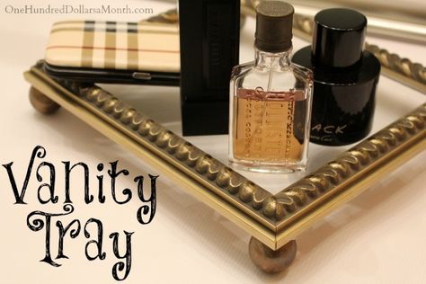 DIY Vanity Tray. You know those vanity trays you can buy all fancy schmancy and put together...for a price?  Well, they are actually super  easy to make, and bonus, they cost about a fraction of the price--especially if you have an old frame lying around. You'll Need:... Picture Frame Tray Diy, Diy Vanity Tray, Cabinet Doors Diy Projects, Upcycle Frames, Repurpose Picture Frames, Upcycled Picture Frames, Picture Frame Diy, Spray Paint Wood, Picture Frame Tray