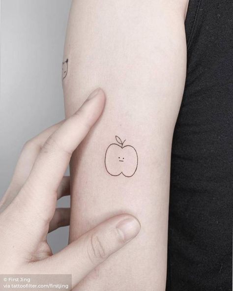 Apple tattoo on the bicep. Cute Apple Tattoo, Fine Line Apple Tattoo, Fiona Apple Tattoo Ideas, Fiona Tattoo, Fiona Apple Tattoo, Apple Tattoos, Ornamental Tattoos, Apple Tattoo, Believe Tattoos