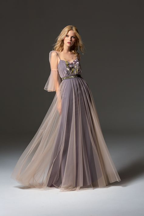 A soft tulle overlay a sleek spaghetti dress. Gentle floral appliques gives a romantic #style. #formal #eveningdress Asian Style Prom Dress, Tulle Overlay Dress, Spaghetti Dress, Evening Gowns With Sleeves, Exquisite Gowns, Style Formal, Soft Tulle, Gorgeous Gowns, Romantic Style