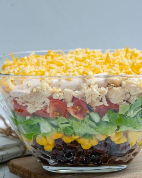 Make this Beautiful Seven Layer Chicken Taco Salad for Clean Eats! | Clean Food Crush Chicken Taco Salad Recipe, Taco Salad Ingredients, Taco Salad Recipe, Chicken Taco Salad, Layer Chicken, Zucchini Puffer, Taco Salad Recipes, Creamy Dressing, Layered Salad