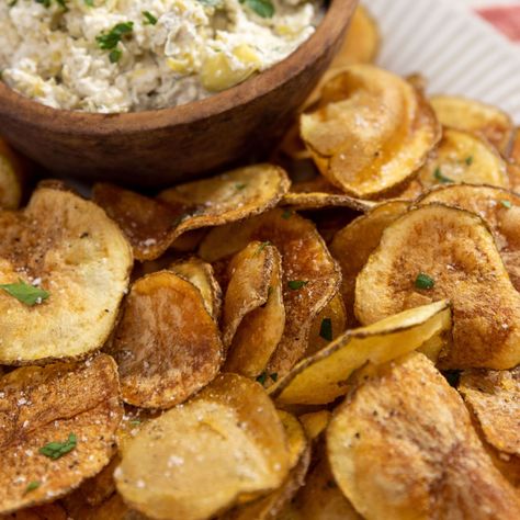 Homemade Potato Chips Recipe - Magnolia Homemade Potato Chips Recipe, Magnolia Recipes, Magnolia Table Recipes, Potato Chips Recipe, Chocolate Potato Chips, Homemade Potato Chips, Joanna Gaines Recipes, Chip Recipes, Magnolia Network