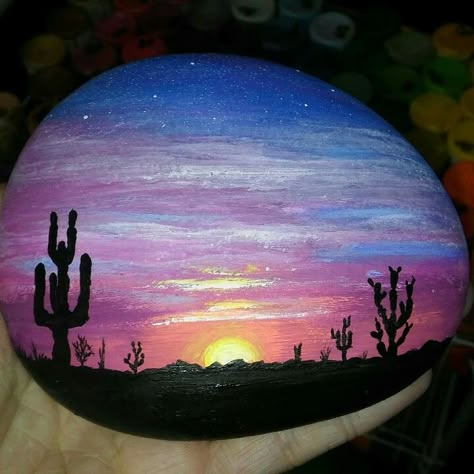 Sunset in the desert rock. Sunset Painting On Rock, Stone Painting Sunset, Rock Art Sunset, Cool Rock Painting Ideas Sunset, Silhouette Rock Painting, Large Rock Painting Ideas, Sunset Rock Painting, Stone Art Painting, Paint Rocks