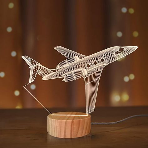 The Winter holiday season is already upon us and during this, many are trying to get ideas on what to buy their loved ones. With that said, here are ten great gift ideas for young aviation geeks and aspiring pilots. Ranging from mugs to remote-controlled paper airplanes, this list has it all. Plane Room Decor, Plane Room, Rocket Lamp, Plane Gifts, Nurses Week Gifts, 3d Illusion Lamp, 3d Night Light, Pilot Gifts, 3d Illusion