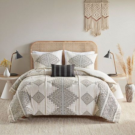 This soft microfiber artisan comforter set features a printed global inspired design of small triangular shapes and lines that when formed together depicts larger geometric shapes and stripes with two chenille trims.Set includes comforter, 2 matching shams, 1 square throw pillow.Printed microfiber; 100% polyester filling.Global inspired design featuring black/brown triangular shapes and lines on top of a beige and ivory background.Two vertical puffy chenille trim accent the top of bed for nice details.Machine washable and spot clean fabric (see care label).Items may come in compressed packaging to ensure efficient shipping.Items will need to be fluffed up and steam ironed if compressed.Hypoallergenic polyester filling in the comforter and pillow (filling contains no allergens and is treate Chic Boho Bedroom, Linen Comforter, Western Bedding, How To Clean Pillows, Top Of Bed, Home Decor Colors, Print Comforter, Madison Park, Bedding Stores