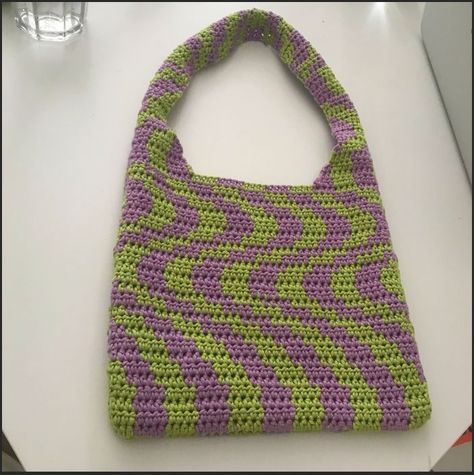 purple and green wavy pattern crochet bag Crochet Wavy Bag Pattern, Wavy Pattern Crochet, Crochet Bag Purple, Crochet Wavy Bag, Purple Crochet Projects, Wavy Crochet Pattern, Green And Purple Crochet, Purple And Green Crochet, Green Crochet Bag