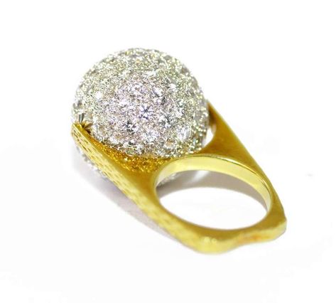 For Sale on 1stdibs - A ring in the form of a pave diamond set sphere set on a central pin allowing it to spin . Set on a textured 18ct yellow gold ring mount. Circa 1960. Measures Contemporary Jewelry Rings, Vintage Cocktail Rings, Vintage Cocktail Ring, Necklace Extender, Contemporary Ring, Diamond Cocktail Rings, Vintage Cocktail, Diamond Gold, Diamond Set