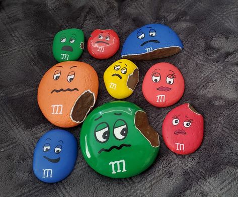 M M Rocks, M&m Crafts, Mm Rock Painting, M&m Painting, M And M Rock Painting, M And M Painted Rocks, M&m Rock Painting Ideas, Rock Painting Ideas M&m, Rock Painting M&m