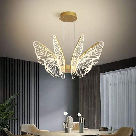 This ceiling LED butterfly chandelier is a modern and minimalist decoration that will add a touch of elegance to any room. The butterflies are made of high-quality LED lights, which provide a soft and diffused light that is perfect for everyday use. The chandelier is also dimmable, so you can adjust the brightness to create the perfect ambiance. This chandelier is perfect for use in a variety of settings, including living rooms, dining rooms, bedrooms, and shops. Chandelier Butterfly, Modern Minimalist Room, Wall Led Light, Led Butterfly, Butterfly Model, Butterfly Chandeliers, Living Room Dining Table, Dining Table In Living Room, Glittery Wallpaper