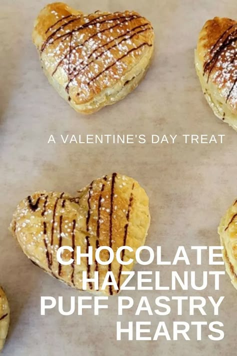 Hazelnut Puff Pastry hearts are a delicious treat for Valentine's Day - or any day for a special someone in your life. #ValentinesDesserts #HeartShapedDesserts #NutellaDesserts #PuffPastryDessert via @https://www.pinterest.com/DessertsWithStephanie/ Valentines Nutella Pastry, Puff Pastry Love Letter, Chocolate Hazelnut Puff Pastry, Nutella Puff Pastry Valentines, Heart Shaped Puff Pastry Desserts, Raspberry Nutella Puff Pastry Heart, Crescent Dough Hearts, Puff Pastry Recipes Valentines, Puff Pastry Dessert Valentines