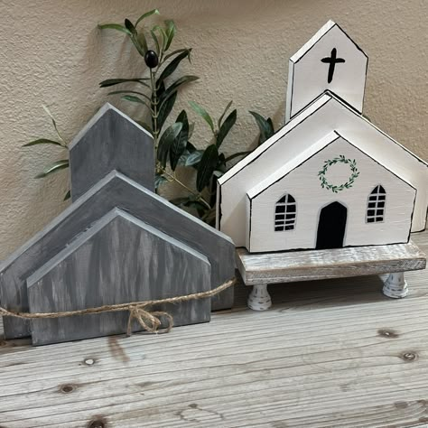 Step into a world of rustic elegance with our handcrafted White or Gray Wooden Church décor piece, meticulously crafted to add a touch of vintage charm to your home or event. Whether adorning your mantelpiece, centerpiece, or shelf, this intricately designed miniature church evokes a sense of serenity and timeless beauty. Made from high-quality, durable wood and finished in a crisp white hue, it seamlessly complements any décor style, from farmhouse chic to classic elegance. Perfect for weddings, holidays, or everyday display, this exquisite piece invites admiration and awe. Add a touch of enchantment to your space with our White Wooden Church - a testament to craftsmanship and grace. Easter Tabletop Decor, Wooden Churches, Chicken Door, He Is Risen Easter, Bottle Caddy, Wooden Church, Church Easter Decorations, Woodwork Projects, Wooden Figures