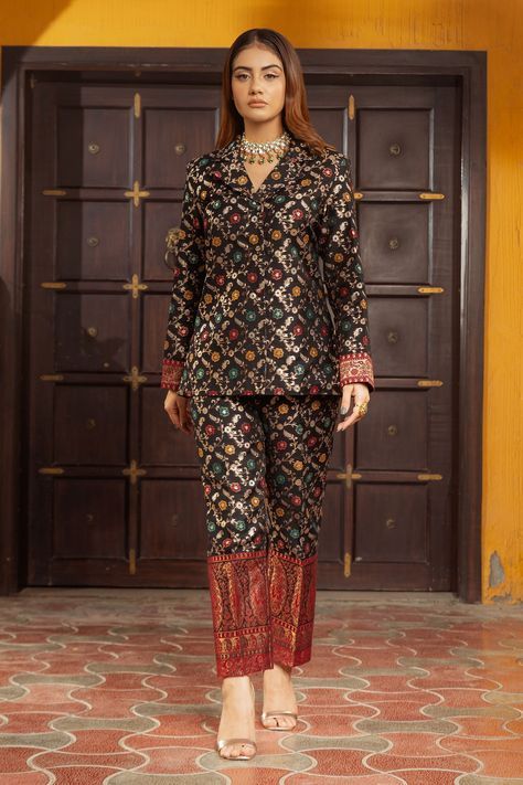 Black woven moonga silk blazer with multi color floral jaal pattern and notched collar. Paired with pants.
Component: 2
Pattern: Woven
Type Of Work: Floral Jaal Pattern
Neckline: Notched Collar
Sleeve Type: Full Sleeves
Fabric: Moonga Silk, Lining: Satin
Color: Black,Multi Color
Other Details: 
Red contrast paisley borders
Front button closure
Attached lining
Occasion: Party,Cocktail - Aza Fashions Trending Indo Western Outfits, Marriage Outfit, Long Blouse Designs, Cocktail Party Outfit, Salwar Suit Designs, Mangalsutra Design, Silk Blazer, Brocade Dress, Indian Gowns