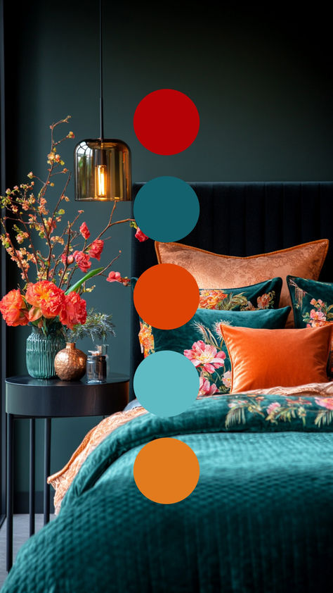 Moody dark blue walls mixed with bedding in hues of teal, orange, and deep red. Sensational! Rust Teal Bedroom, Bright Bedroom Color Schemes, Teal And Orange Interior Design, Red Blue Orange Color Scheme, Dark Blue And Red Color Palette, Colors That Go With Dark Teal, Cozy Bedroom Color Palette, Burnt Orange And Teal Bedroom, Bright Colour Bedroom Ideas