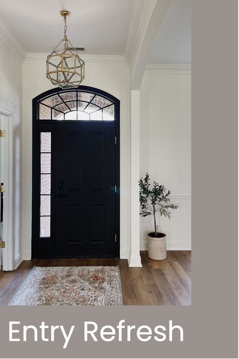 I gave my entry a makeover by painting the front door black...I couldn't love it more! Painting The Front Door, Front Door Black, Door Black, Small Lanterns, Entry Way, Love It, Front Door, Lanterns, Entryway