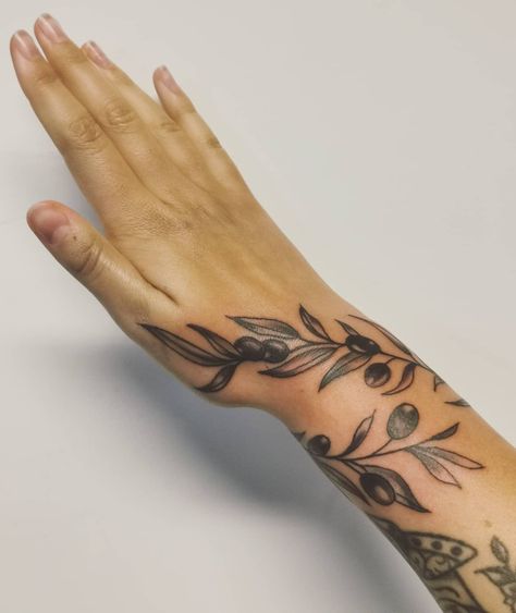 Olive Branch Tattoo Sleeve, Olive Tree Branch Tattoo Wrap Around, Olive Leaf Tattoo Arm, Greek Plant Tattoo, Branch Wrap Around Tattoo, Olive Branch Wrap Tattoo, Olive Branch Hand Tattoo, Olive Branch Wrap Around Tattoo, Olive Tattoo Branch