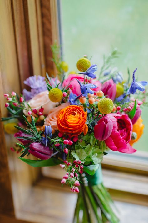 Simply spring wedding bouquet. Photo courtesy of Pixel Perfection Multi Color Bouquet, Rainbow Bouquet Wedding, Colorful Summer Wedding Flowers, Bright Wedding Color Schemes, Colorful Flowers Wedding, Bright Bridal Bouquet, Wildflower Arrangements, Bright Wedding Bouquet, Colourful Bouquet