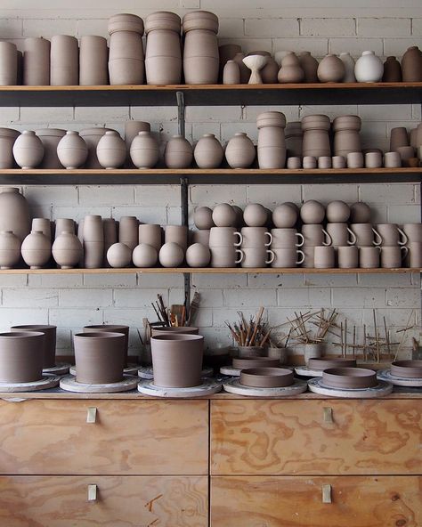 Full Shelves. Most of these pieces are about to be packed into the kiln and will… Pottery Shelf Display, Pottery Wall Shelf, Display Shelves For Pottery, Pottery Shelves Ceramic Studio, Pottery Storage Jars, Artists Studios, Outside Fall Decor, Art Studio Design, Pottery Inspo