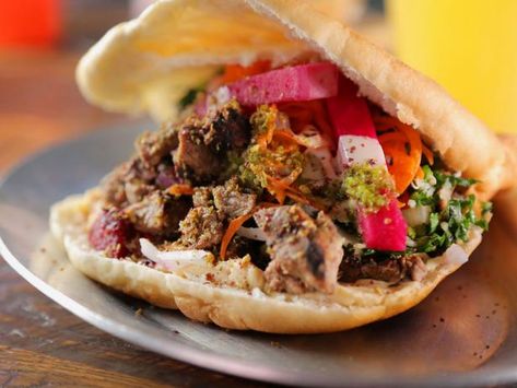 Get Steak Shawarma Pita Recipe from Food Network Steak Shawarma, Shawarma Recipes, Lighter Meals, Pita Recipe, Pita Sandwich, Pita Recipes, Quinoa Tabbouleh, Shawarma Recipe, Famous Food