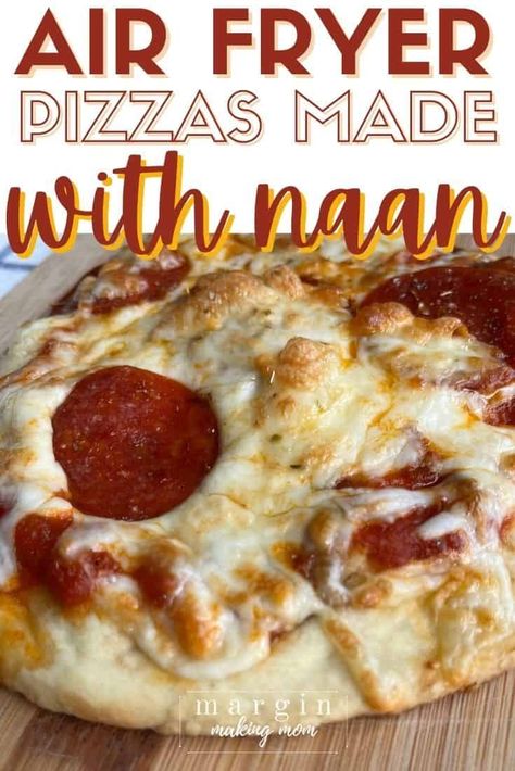 Learn how to make easy pizzas in the air fryer using naan bread! This is a great shortcut and makes a simple lunch or dinner idea. Air Fryer Naan Pizza Recipes, Air Fry Naan Pizza, Naan Bread In Air Fryer, Airfryer Naan Pizza, Nan Bread Pizza Air Fryer, Naan Rounds Recipes, Naan Bread Pizza Air Fryer, Naan Bread Meals, What To Do With Naan Bread