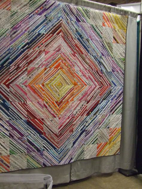 Selvage strip quilt | 2011 Fiber Arts Fiesta, Albuquerque, N… | By: Joyce in the CactusPatch | Flickr - Photo Sharing! Selvage Projects, Selvage Quilts, Strip Quilt, String Quilt, Quilt Modernen, String Quilts, Pretty Quilt, Strip Quilts, Scrappy Quilt