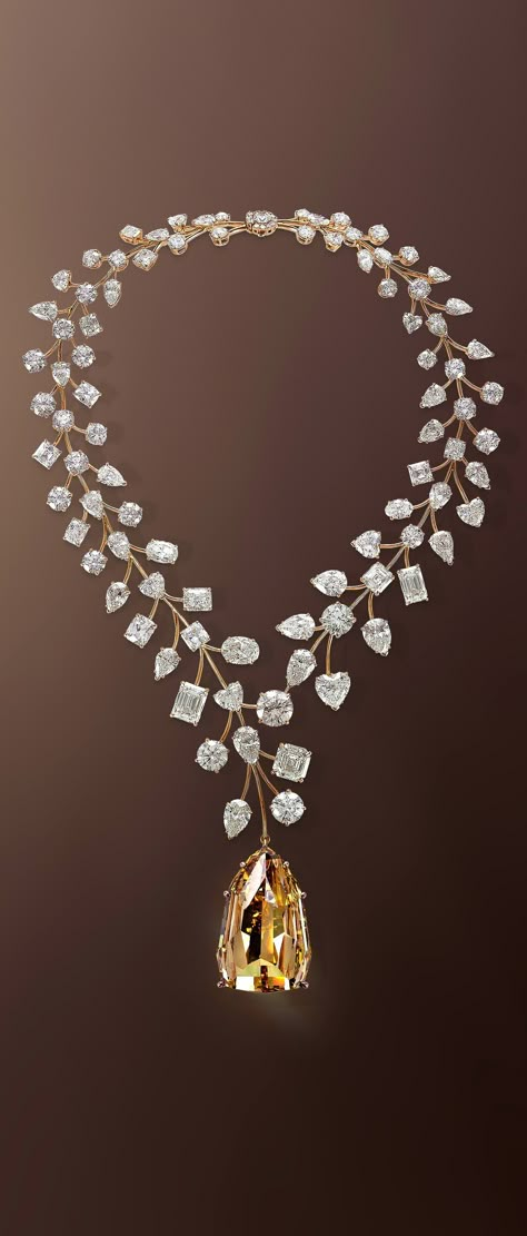 The Mouawad L’Incomparable Diamond Necklace Features the Flawless 407.48-Carat Yellow Diamond, Suspended from a White Diamond Necklace Intertwined by 18-Karat Rose Gold Branchlets Diamond Necklace With Pendant, Yellow Gold Diamond Necklace, Luxury Necklace Diamonds, Unique Diamond Necklace, Yellow Diamond Pendant, Yellow Diamond Jewelry, Yellow Diamond Necklace, Beautiful Diamond Necklace, Colored Diamond Jewelry