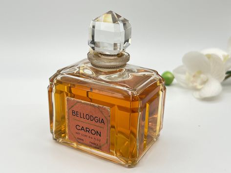 Rare vintage 60's. "Bellodgia" by Caron Paris. Pure perfume/extrait 96 ml/3.25 US fl.oz. Gorgeous Baccarat crystal bottle. It still retains the original seal, wrapped in a plastic capsule. The box is missing. Exposed to light only for taking pictures. Stored in a dark and dry place. The product that will be shipped is exactly what you see in the photo. Bellodgia (Parfum) is a popular perfume by Caron for women and was released in 1927. The scent is spicy-floral. The longevity is above-average. T Popular Perfume, Crystal Bottle, Popular Perfumes, Baccarat Crystal, Sweet Smell, Perfume Collection, Baccarat, Fragrance Notes, Ylang Ylang