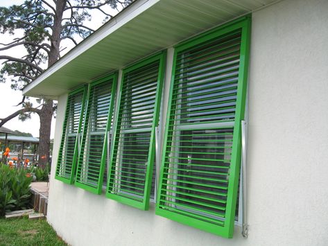 white-wall-plus-bahama-shutters-plus-greenery-for-exterior-design-bahama-shutter-hardware-diy-bahama-shutters-cheap-bahama-shutters-how-to-build-bah « STORM SHUTTER MECHANIC Colonial Shutters, Bermuda Shutters, California Shutters, Types Of Shutters, Red Shutters, Bahama Shutters, Outdoor Shutters, Window Protection, Different House Styles