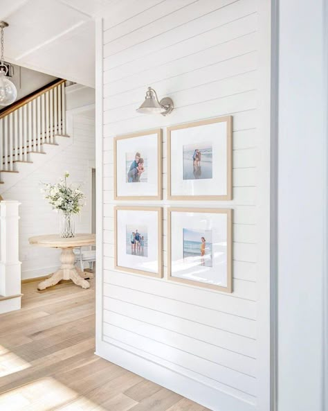 Modern Farmhouse Gallery Wall with Wall Sconce - Shiplap - Natural Wood Frames - White Walls - White Oak Wood Floors Modern Coastal Farmhouse, Casa Country, Modern Farmhouse Living, Modern Farmhouse Home, Framed Pictures, Modern Farmhouse Living Room, Farmhouse Interior, Coastal Farmhouse, Florida House