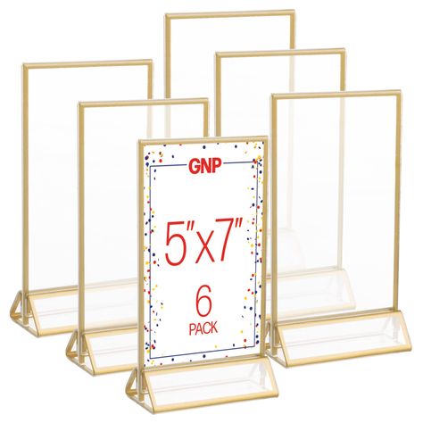 PRICES MAY VARY. PICTURE FRAME 6-PACK - This 5-inch by 7-inch acrylic sign holder set is perfect for displaying menus, table numbers, photos, or creating custom centerpiece table decorations. These gold frames will add an elegant touch to any display. DOUBLE-SIDED - These tabletop floating frames can be viewed from both the front and back, for a stylish display from any angle. The dual-sided presentation makes them great for placing in the center of a table or on a bar. MULTIPURPOSE DISPLAY - Th Contemporary Picture Frames, Floating Frames, 5x7 Picture Frames, Table Number Holders, 4x6 Picture Frames, Wedding Numbers, Centerpiece Table, Picture Stand, Gold Frames