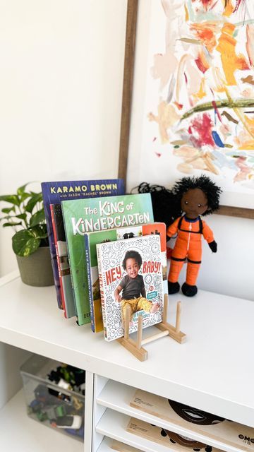 Ikea Kids Books, Living Room Kid Book Storage, Ikea Book Holder, Ikea Book Display, Ikea Ostbit Hack, Ostbit Ikea Hack, Organizing Kids Books, Ikea Book, Ikea Playroom