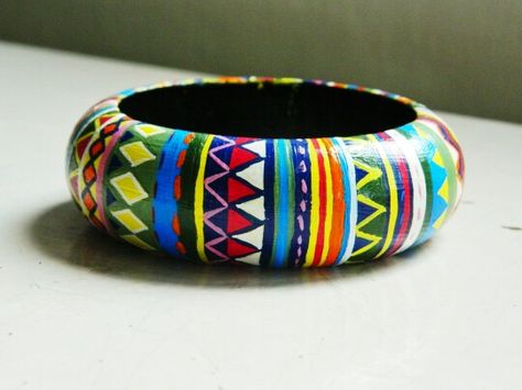 Hand painted wooden bangle Hand Painted Wooden Jewellery, Boho Wood Jewelry, Wooden Bangles Painted, Hand Painted Bangles, Diy Mug Designs, Wooden Bangles, Wood Jewelry Diy, Wooden Bangle Bracelet, Diy Earrings Easy