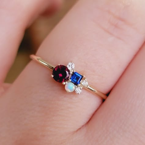 "Gemstone Ring, Cluster Diamond Ring, Cluster Gemstones Ring, Personalized Ring, Birthstone Ring, 3.5mm Garnet , Emerald  Ring, Multicolor  Ring, Personalized Gift   ♥ Features : * Made to Order. * Made in NYC. * Gold: Solid 14K( Also available in18K)  *Width of band: 1.3mm * Choice of Gold:  Yellow Gold, White Gold or Rose Gold * Gem Stone:  Blue Sapphire, Emerald, Ruby, and Mined  Diamond  (could be customized in any gemstone color of your choice ) * Stones details: * 3 PCS Round Diamonds 1.5m Garnet And Sapphire Ring, Multiple Gemstone Rings, Sapphire And Ruby Ring, Ruby And Sapphire Ring, Gems Ring, Cluster Diamond Ring, Unique Wedding Jewelry, Sapphire And Diamond Band, Ring Cluster