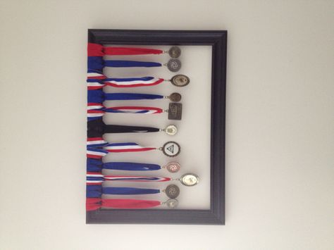 Ways to display medals Display Medals And Ribbons, How To Hang Medals Display Ideas, Ways To Display Medals, Hanging Medals Ideas, How To Display Medals, Medals Display Ideas, Medal Display Ideas, Display Medals, Awards Display