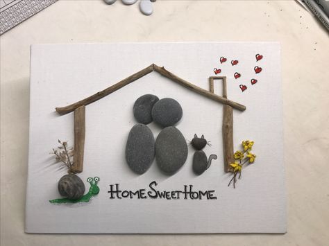 Pebble art, home sweet home, snuggling couple in their new home, snail, cat and family :) New Home Pebble Art Ideas, Pebble Art New Home, New Home Pebble Art, Pebble Cards, Snuggling Couple, Stone Art Diy, River Rock Crafts, Bird Paper Craft, Pebble People