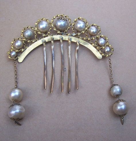 1850s-60s "Algerian style" decorative hair comb of gilded brass with faux pearl beads. H 3½ ", w 4½ ", length of dangles 3¼ ". Ruby Lane seller The Spanish Comb. Antique Hair Combs, Pearls Hair, Victorian Accessories, Decorative Hair Combs, Hair Pick, Victorian Hairstyles, Hair Slides, Arabic Style, Vintage Hair Combs