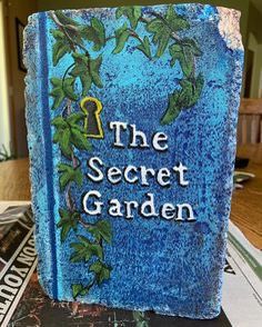 Book Stepping Stones, Painting Bricks To Look Like Books, Garden Brick Books, Book Bricks Garden, Painted Brick Books, Painted Bricks For Garden, Brick Books Garden, Brick Painting Ideas Craft, Paint Bricks