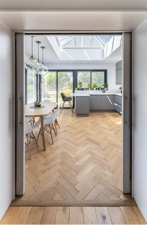 Parquetry Flooring Kitchen, Scandinavian Herringbone Floor, Two Different Wood Floors Transitioning Living Room, Oak Parquet Flooring Kitchen, Modern Herringbone Floor, Parquet Flooring Kitchen Modern, Natural Oak Herringbone Floor, Herringbone And Straight Wood Floor, Modern Kitchen Herringbone Floor