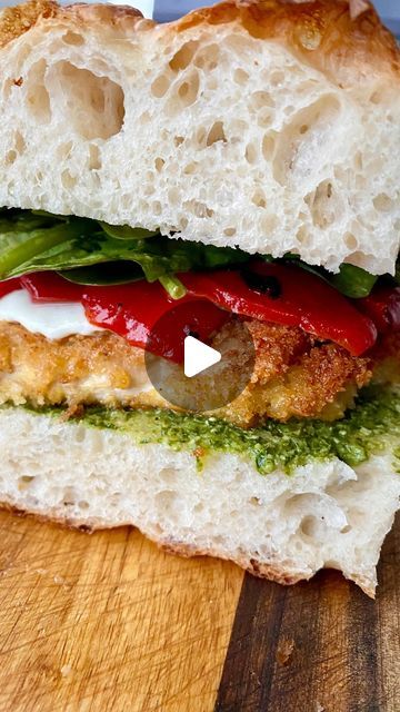 Kim | Home Baker & Digital Creator on Instagram: "LOADED CHICKEN SANDWICH ✨ Crispy breaded chicken with pesto, mozzarella, roasted red pepper, and spinach tossed in a light Caesar. All on homemade focaccia (go check out my most recent focaccia reel) 🤤

What a mouthful. Literally. 

#sandwich #breadedchicken #pesto #roastedredpeppers #mozzarella #easylunch #healthylunch #recipe #focaccia #homemadefocaccia #chickensandwich #cookingvideo #lunchideas #sandwiches #sandwichporn #sandwichrecipe #chickencutlet #sandwichlove #easyrecipes #easysandwich #basilpesto #chickencutletsandwich" Chicken And Spinach Sandwich, Pesto Focaccia Sandwich, Pesto Chicken Sandwich On Sourdough, Chicken Pesto Focaccia Sandwich, Chicken Pesto Chibatta Sandwich, Mozerella Tomato Pesto Sandwich, Simple Sandwiches, Basil Pesto, Pesto Chicken